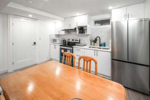 4216 Brisebois Drive Nw, Calgary, AB - Indoor Photo Showing Kitchen With Double Sink