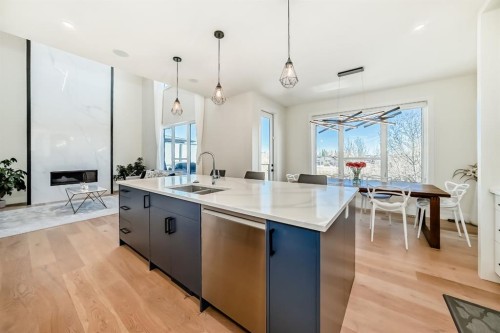 76 Rock Lake View Nw, Calgary, AB - Indoor Photo Showing Kitchen With Double Sink With Upgraded Kitchen