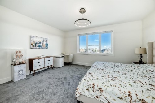 76 Rock Lake View Nw, Calgary, AB - Indoor Photo Showing Bedroom