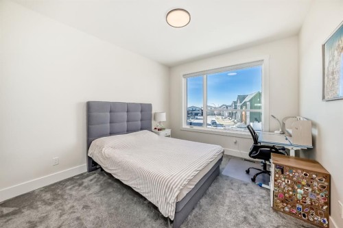76 Rock Lake View Nw, Calgary, AB - Indoor Photo Showing Bedroom