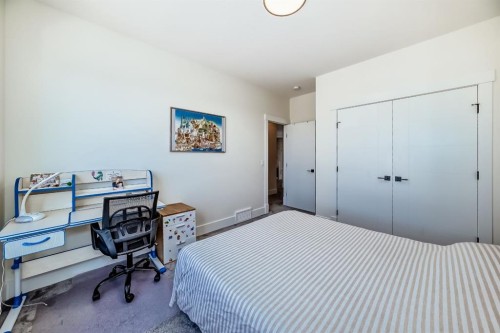 76 Rock Lake View Nw, Calgary, AB - Indoor Photo Showing Bedroom