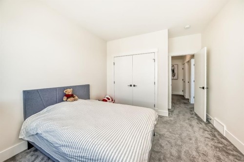 76 Rock Lake View Nw, Calgary, AB - Indoor Photo Showing Bedroom