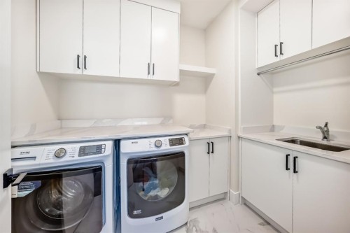 76 Rock Lake View Nw, Calgary, AB - Indoor Photo Showing Laundry Room