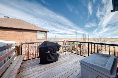 33 Boulder Creek Manor Se, Langdon, AB - Outdoor With Deck Patio Veranda With Exterior