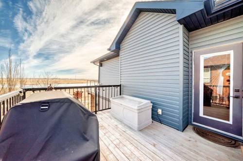 33 Boulder Creek Manor Se, Langdon, AB - Outdoor With Deck Patio Veranda With Exterior