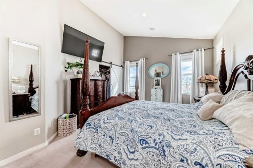 33 Boulder Creek Manor Se, Langdon, AB - Indoor Photo Showing Bedroom