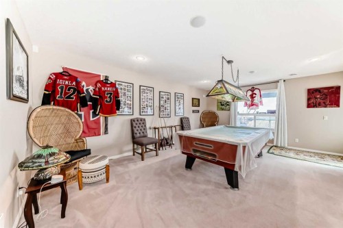 33 Boulder Creek Manor Se, Langdon, AB - Indoor Photo Showing Other Room