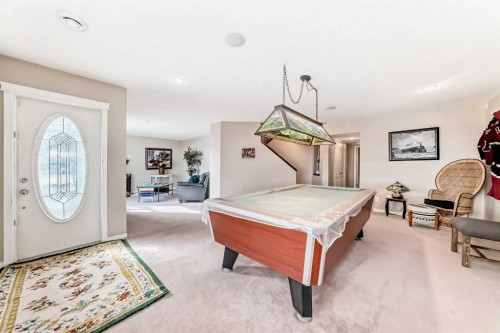 33 Boulder Creek Manor Se, Langdon, AB - Indoor Photo Showing Other Room