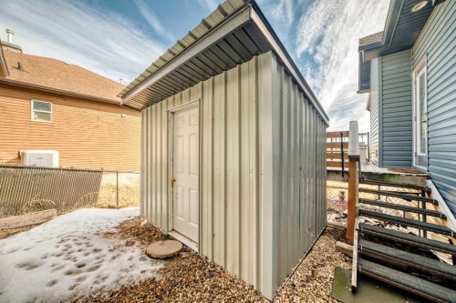 33 Boulder Creek Manor Se, Langdon, AB - Outdoor With Exterior