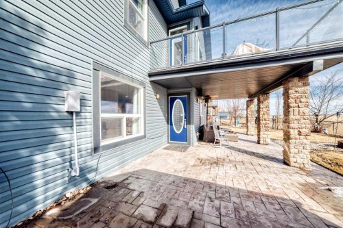 33 Boulder Creek Manor Se, Langdon, AB - Outdoor With Deck Patio Veranda