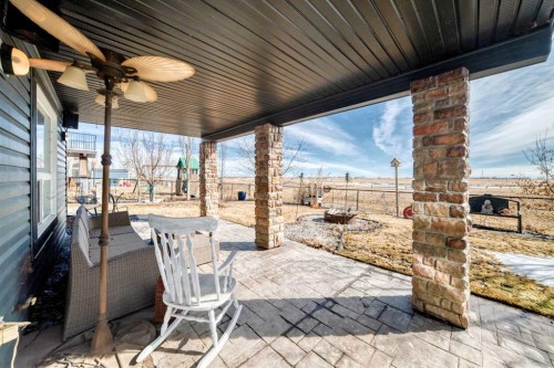 33 Boulder Creek Manor Se, Langdon, AB - Outdoor With Deck Patio Veranda