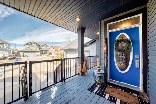 33 Boulder Creek Manor Se, Langdon, AB - Outdoor With Deck Patio Veranda With Exterior