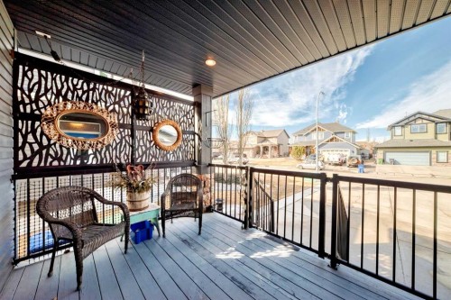 33 Boulder Creek Manor Se, Langdon, AB - Outdoor With Deck Patio Veranda With Exterior