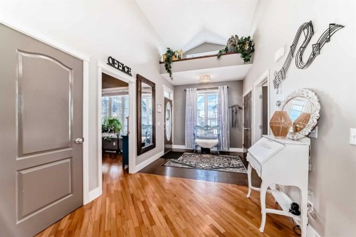 33 Boulder Creek Manor Se, Langdon, AB - Indoor Photo Showing Other Room