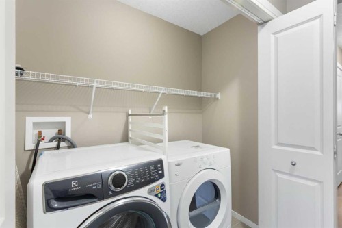 98 Nolanfield Road Nw, Calgary, AB - Indoor Photo Showing Laundry Room