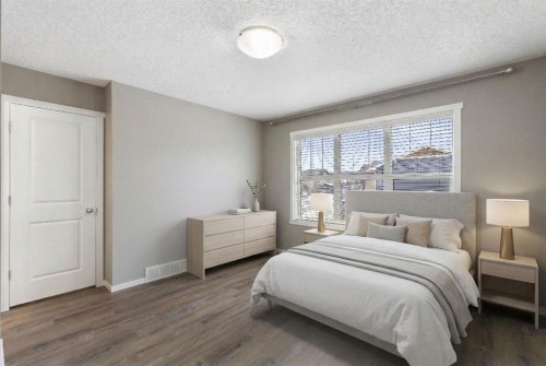 98 Nolanfield Road Nw, Calgary, AB - Indoor Photo Showing Bedroom