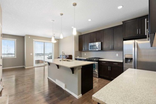 98 Nolanfield Road Nw, Calgary, AB - Indoor Photo Showing Kitchen With Upgraded Kitchen