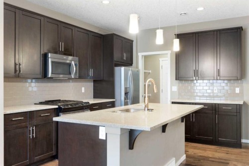 98 Nolanfield Road Nw, Calgary, AB - Indoor Photo Showing Kitchen With Upgraded Kitchen