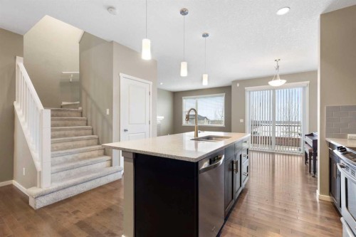 98 Nolanfield Road Nw, Calgary, AB - Indoor Photo Showing Kitchen With Double Sink With Upgraded Kitchen