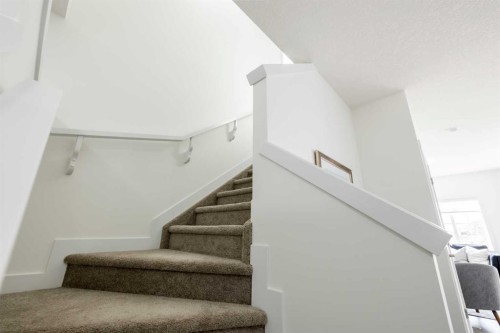 44 Heritage Manor, Cochrane, AB - Indoor Photo Showing Other Room