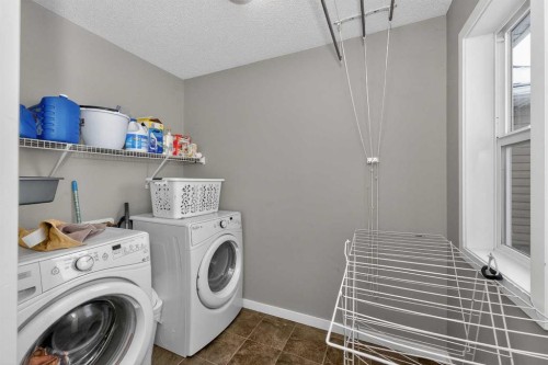 45 Redstone Drive Ne, Calgary, AB - Indoor Photo Showing Laundry Room