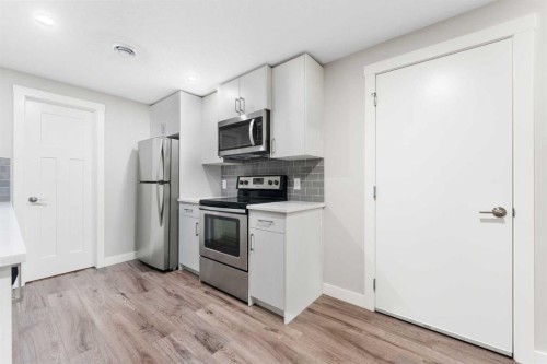 24 Seton Grove Se, Calgary, AB - Indoor Photo Showing Kitchen With Stainless Steel Kitchen