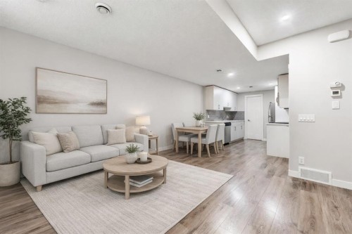 24 Seton Grove Se, Calgary, AB - Indoor Photo Showing Living Room