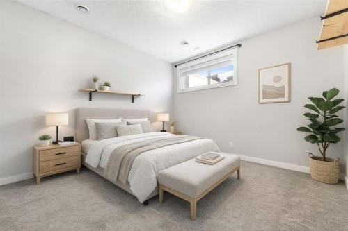 24 Seton Grove Se, Calgary, AB - Indoor Photo Showing Bedroom