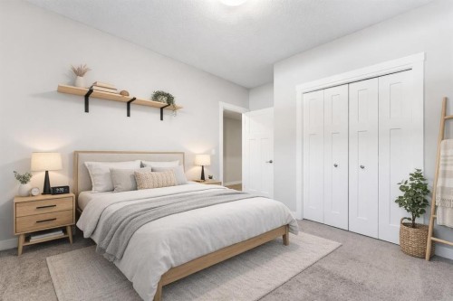 24 Seton Grove Se, Calgary, AB - Indoor Photo Showing Bedroom