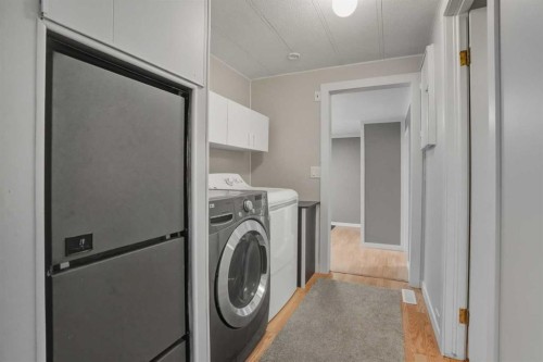 8 29415  Range Rd 52, Rural Mountain View County, AB - Indoor Photo Showing Laundry Room