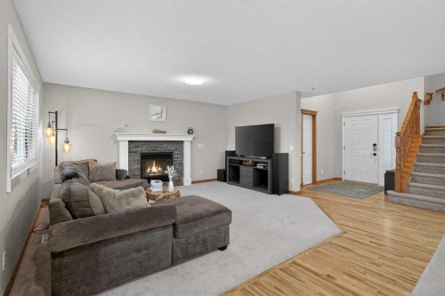112 West Creek Close, Chestermere, AB - Indoor Photo Showing Living Room With Fireplace