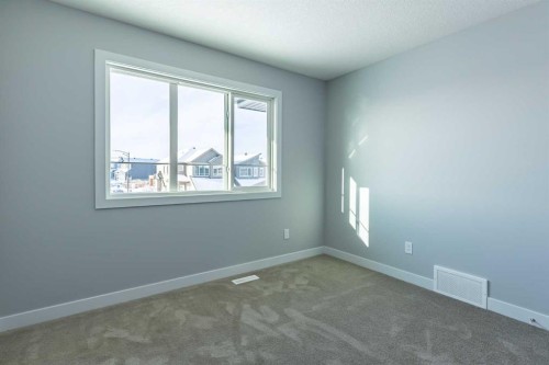 3 Heritage Point, Cochrane, AB - Indoor Photo Showing Other Room