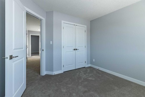 3 Heritage Point, Cochrane, AB - Indoor Photo Showing Other Room
