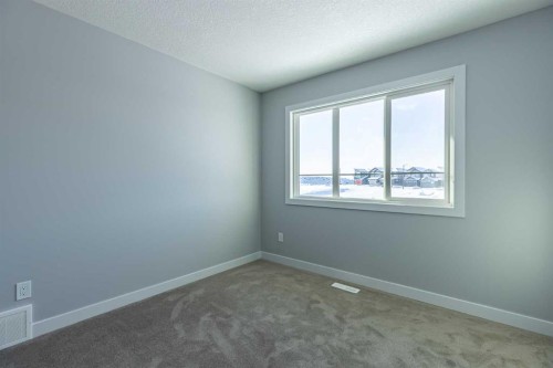 3 Heritage Point, Cochrane, AB - Indoor Photo Showing Other Room