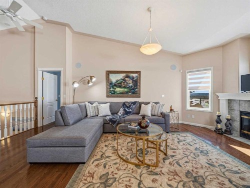 84 Sierra Morena Landing Sw, Calgary, AB - Indoor Photo Showing Living Room With Fireplace