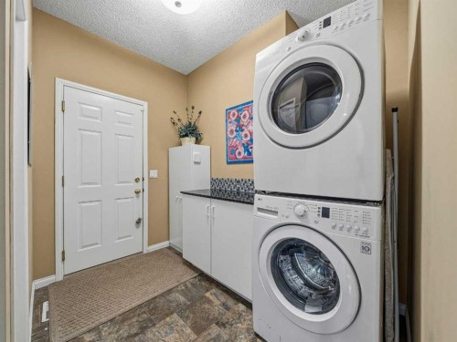 84 Sierra Morena Landing Sw, Calgary, AB - Indoor Photo Showing Laundry Room