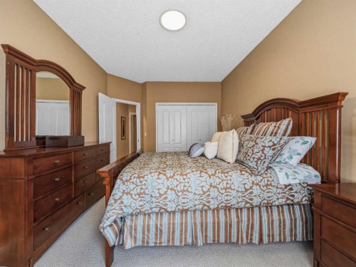 84 Sierra Morena Landing Sw, Calgary, AB - Indoor Photo Showing Bedroom