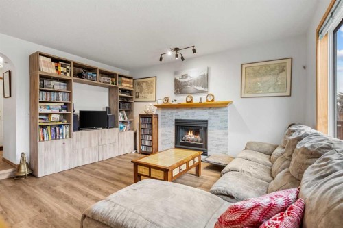 39 Arbour Wood Close Nw, Calgary, AB - Indoor Photo Showing Living Room With Fireplace