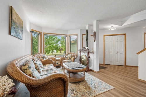39 Arbour Wood Close Nw, Calgary, AB - Indoor Photo Showing Living Room