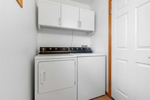 39 Arbour Wood Close Nw, Calgary, AB - Indoor Photo Showing Laundry Room