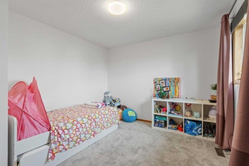 39 Arbour Wood Close Nw, Calgary, AB - Indoor Photo Showing Bedroom
