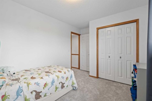 39 Arbour Wood Close Nw, Calgary, AB - Indoor Photo Showing Bedroom