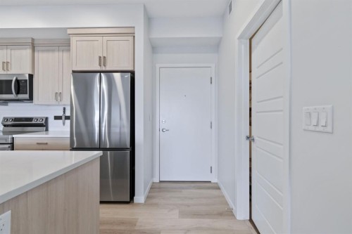 1411-220 Seton Grove Se, Calgary, AB - Indoor Photo Showing Kitchen