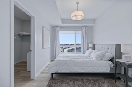 1411-220 Seton Grove Se, Calgary, AB - Indoor Photo Showing Bedroom