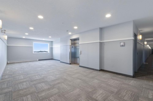 1411-220 Seton Grove Se, Calgary, AB - Indoor Photo Showing Other Room