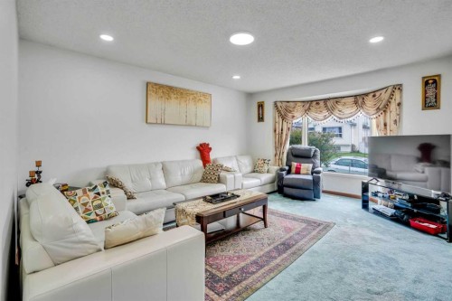 43 Falshire Close Ne, Calgary, AB - Indoor Photo Showing Living Room
