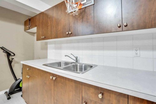 43 Falshire Close Ne, Calgary, AB - Indoor Photo Showing Kitchen With Double Sink