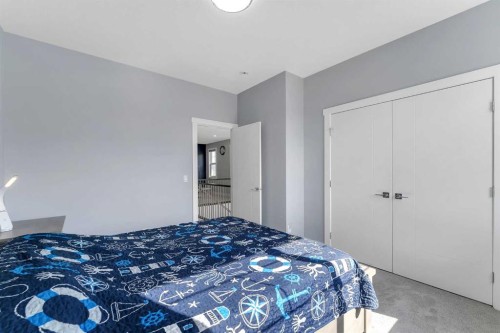 7 Waterford Heights, Chestermere, AB - Indoor Photo Showing Bedroom