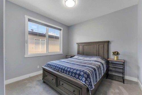 7 Waterford Heights, Chestermere, AB - Indoor Photo Showing Bedroom