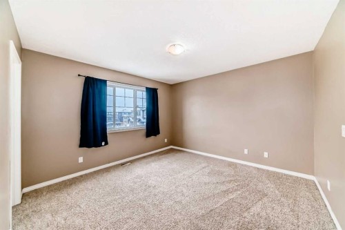 207-620 Luxstone Landing Sw, Airdrie, AB - Indoor Photo Showing Other Room